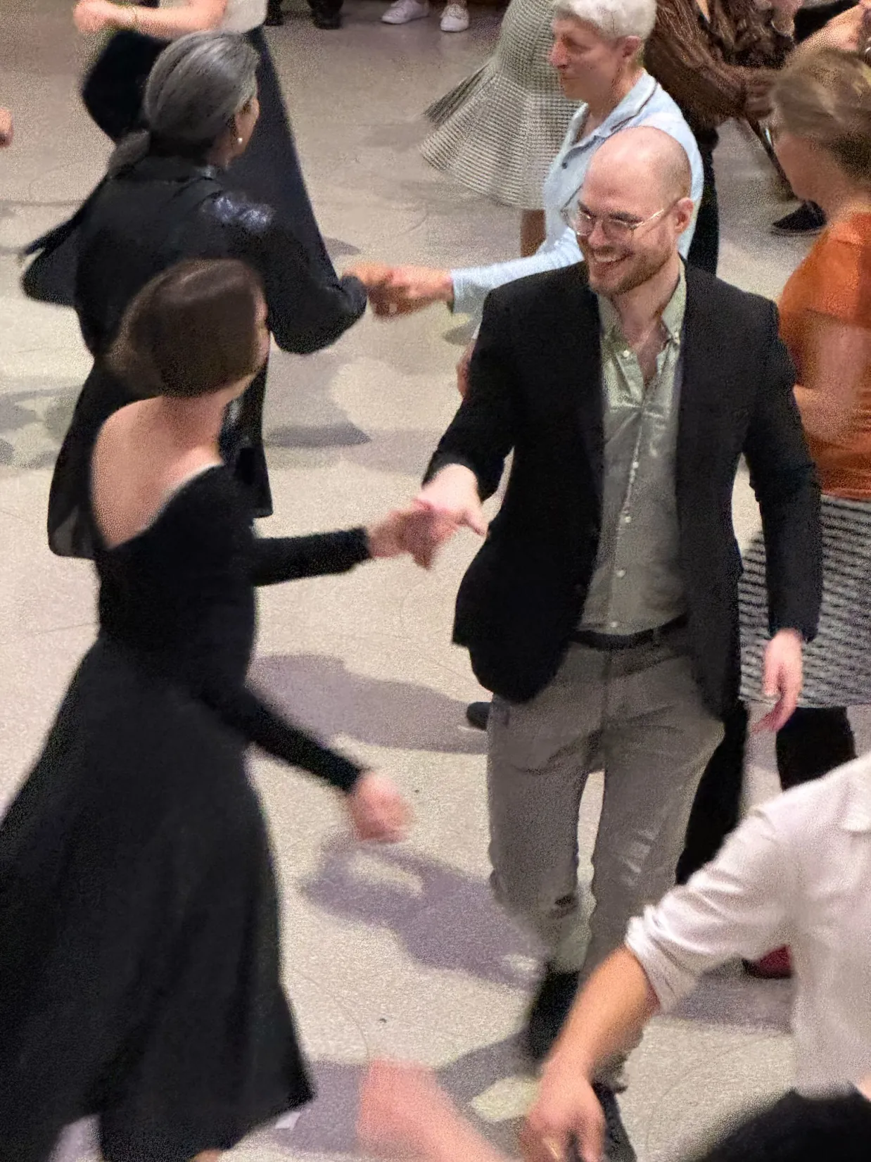 Ben swing dancing with Olivia Meyer in the Guggenheim's rotunda.